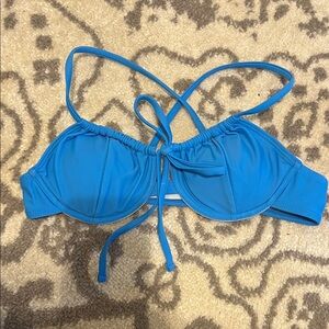 Womens Swim top with underwire and padding. Size S. Never Worn.